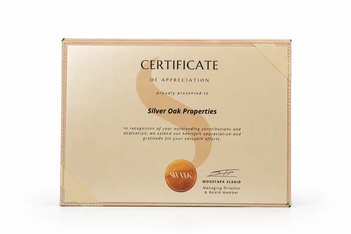 Certificate of Appreciation presented to SILVER OAK PROPERTIES, signed by Moustafa Elsaid, Managing Director and Board Member